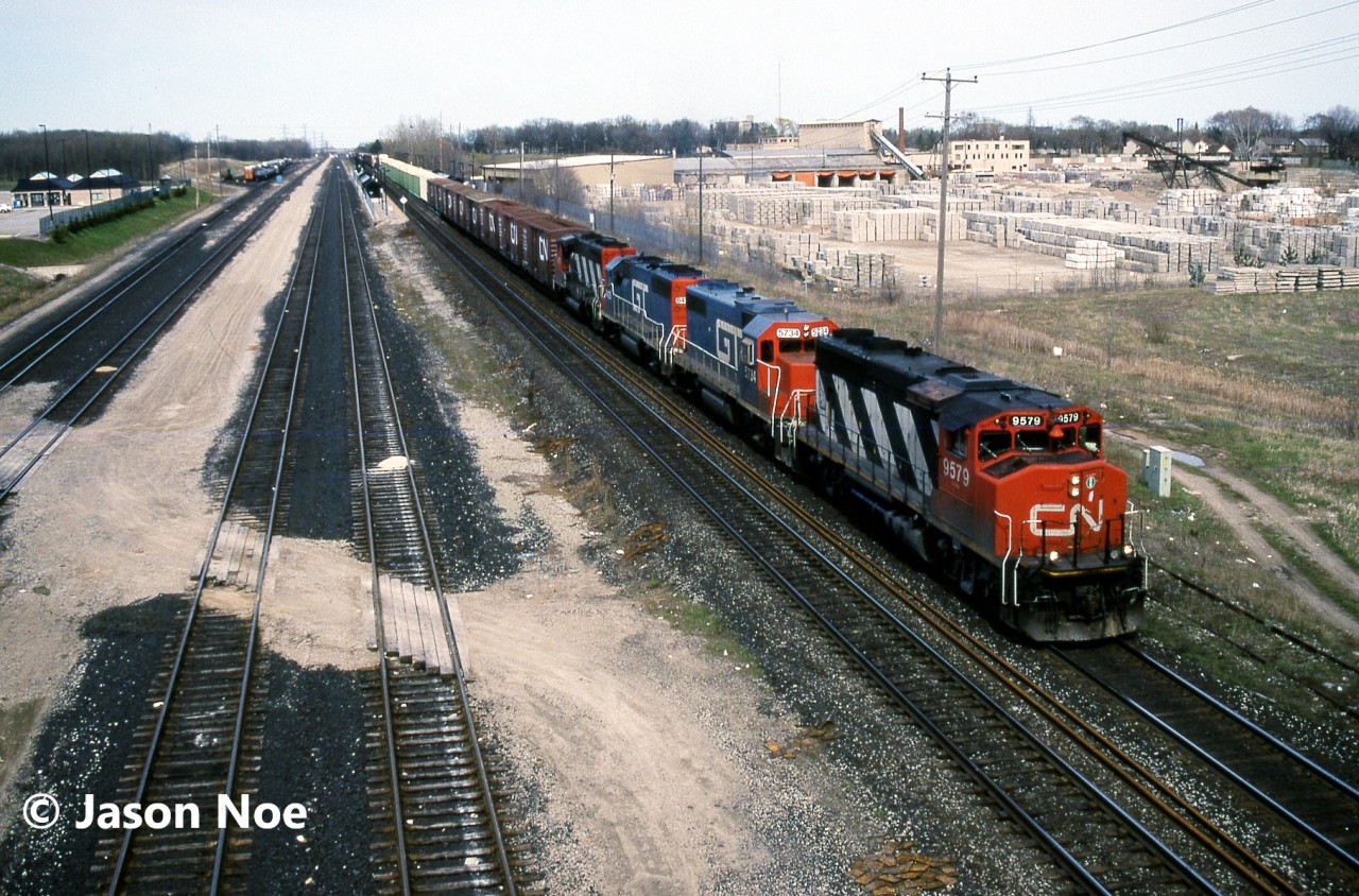 CN train 333 is pictured passing the Aldershot, Ontario GO station on the Oakville Subdivision as it heads to Niagara Falls with 88 cars. The power included; 9579, GTW 5734, GTW 6420 and 9631.