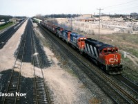 CN train 333 is pictured passing the Aldershot, Ontario GO station on the Oakville Subdivision as it heads to Niagara Falls with 88 cars. The power included; 9579, GTW 5734, GTW 6420 and 9631.
