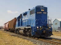 As evidenced in my previous photo showing <a href="http://www.railpictures.ca/?attachment_id=59737"> CPKC Local H89 </a>, sometimes you just have to shoot what you get. In my opinion, locally CN has had more interesting mixes of power. Here, GMTX 2325 is leading CN local 514, in all of its painted blue glory - long hood forward, as it passes by former uard sidings as it exits town. 