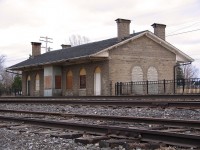 Inspired by Elizabeth A. Wilmore's photo from one of her publications, I decided to replicate her beautiful 3/4 angled shot of the old Grand Trunk station. But, sadly the future of this building was looking quite bleak on this cold March day. Both VIA and a commercial business had closed up shop, and left the station all closed up.
<br>
<br>
A shame really. However, along came the <a href="https://www.grenvillecountyarchives.ca/explore.html"> the Grenville County Historical Society </a> needing a new home. Through countless volunteer hours, they have rejuvenated this once busy station, and have called it home since 2007. Well worth a visit, if you're ever going by. Still a great spot for railfanning too! 