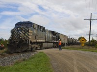 Back in 2017, CP started upgrades to their infrastructure. Here, the railways employees were replacing signs and wooden planks for the crossing at Third Line. Sure enough, any time can be train time. CP train 650 heads east, with CEFX 1054 as the rear DPU passing by under the careful inspection of the crew.