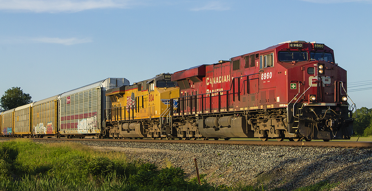 There was a time when almost every CP freight seemed to include foreign power. This evening was no different. Almost that golden hour of sunlight that I recently shot  CPKC H89 in, rolling through downtown Chatham.  Here, shown is UP 8104 being led by CP 8960 westbound, about to cross Caledonia Road on the outskirts of Chatham.