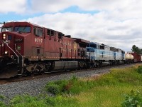 So, here close to supper time was what all the ruckus is about this June day, during the pandemic. After shooting what I thought was <a href="http://www.railpictures.ca/?attachment_id=59736"> THE BETTER CATCH </a>, I still managed to see these CMQ units. After 140 passed by, I still remember thinking, 'I waited all day for this?'...with my disappointment as plain CP 9757 was leading. Oh well. Looking back I'm still glad I did photograph these units coming through Southwestern Ontario.