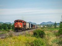 A rare sight since the COVID-19 pandemic but a relatively common one before then, a 4-axle CN locomotive leading the ''big'' freight, train 403. It seems like Joffre yard must have been short of big high-horsepower locomotives to send on train 402 last thursday, as they sent ET44AC 3165 paired with GP40-2WL 9576, the later which will lead the return trip to Joffre as seen here. Today the train was relatively short, with only stock comming from the Matane subdivision, as the train to Campbellton didn't run the previous day. They ended up not making the full trip to Joffre, heading back to Mont-Joli engine light as Joffre did not send a 402 to meet up in Rivière-du-Loup.