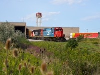 Trunked up. Toronto showed up for this one... Double GTW GP40-2's, one blue and the other CN North America, are seen on the head end of train L529, ready to depart for for MacMillan Yard after working Home Depot Lumber and XTL in the north end of Etobicoke.