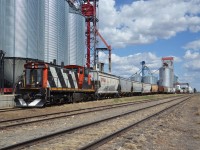 All in a days work, after returning from Nipawin to drop tank cars off for storage, 1432 begins to move cars out of the elevator tracks for their afternoon run back towards Nipawin to interchange with the CPKC.