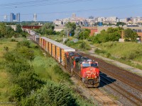 CN M377 rolls through Snider on approach to Mac Yard.