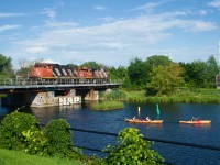 CN 596 is westbound light power over the Lachine Canal with CN 4778 & CN 4731 for power, on its way to lift traffic for the Port of Montreal.