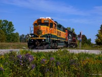 Shortly after 4 axle BNSF units arrived on CN rails to repay horse power hours, a few were assigned to the Toronto pool and dispatched to the local terminals.    Working out of Kitchener, BNSF 2090 is paired with CN 7068 while switching customers around Guelph.