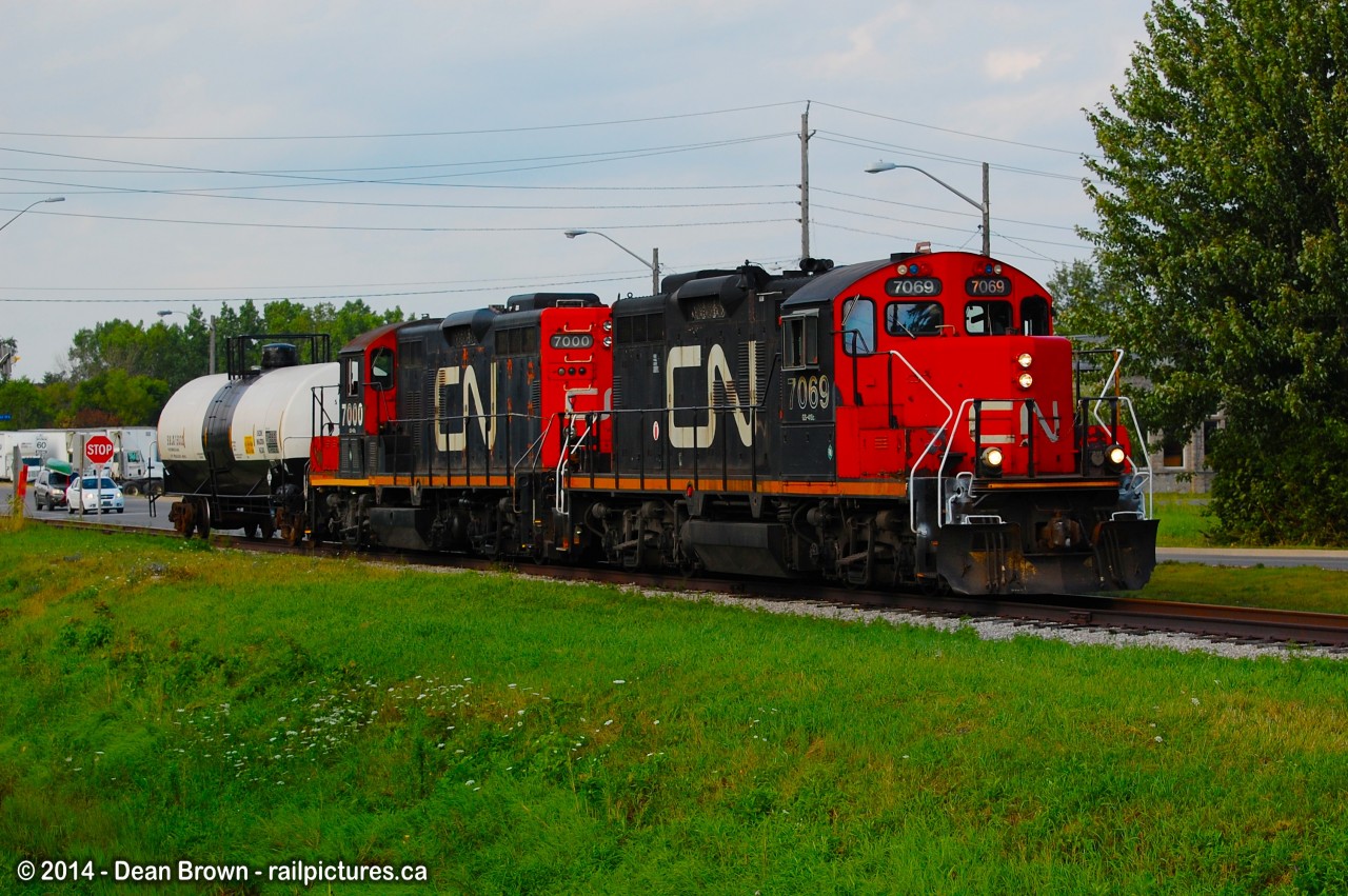 563 with CN GP9RM 7069 and CN GP9RM 7000 heading southbound on the CN Humberstone Spur.