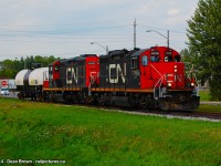 563 with CN GP9RM 7069 and CN GP9RM 7000 heading southbound on the CN Humberstone Spur. 