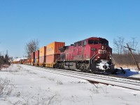 <br>
<br>
CP 9835 East (with DPU CEFX1057) slowing for a meet with the management trainee PSR special CP 8246 west  (with 3041) , 
<br>
<br>
The Coquitlam shop did an interesting job on those number boards. 
<br>
<br>
At Cherrywood March 13, 2014 digital by S.Danko
<br>
<br>
CP operated management trainee specials in anticipation of running trades work stoppages: the Hunter Harrison specials were part of HH”s Precision Scheduled Railroading (PSR): commencing 2012 HH required all non-union, white collar employees (accountants, HR staff, IT workers) to train as conductors or engineers. PSR: to drive down the Operating Ratio.
<br>
<br>
sdfourty

