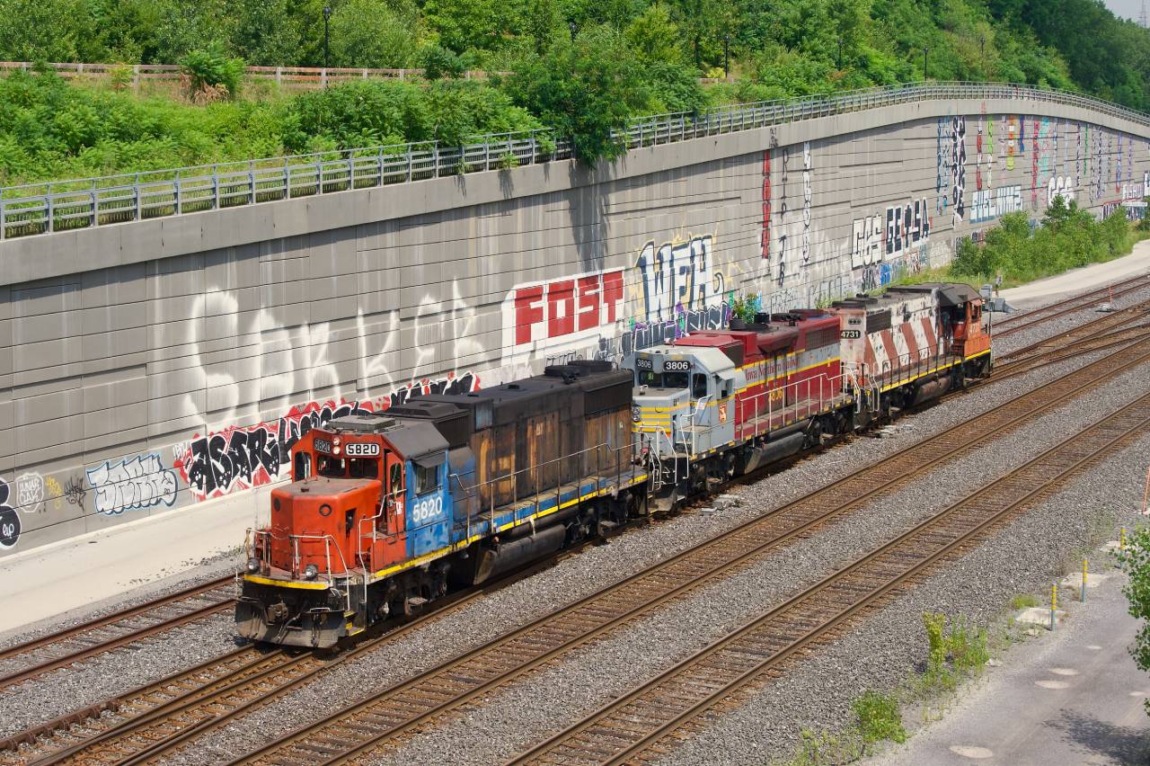 CN 522 with a GTW/IANR/CN lashup has just dropped cars from Southwark off at Turcot Ouest. Who would would have thought these three paint schemes would be together in the year 2026, all on a CN train.