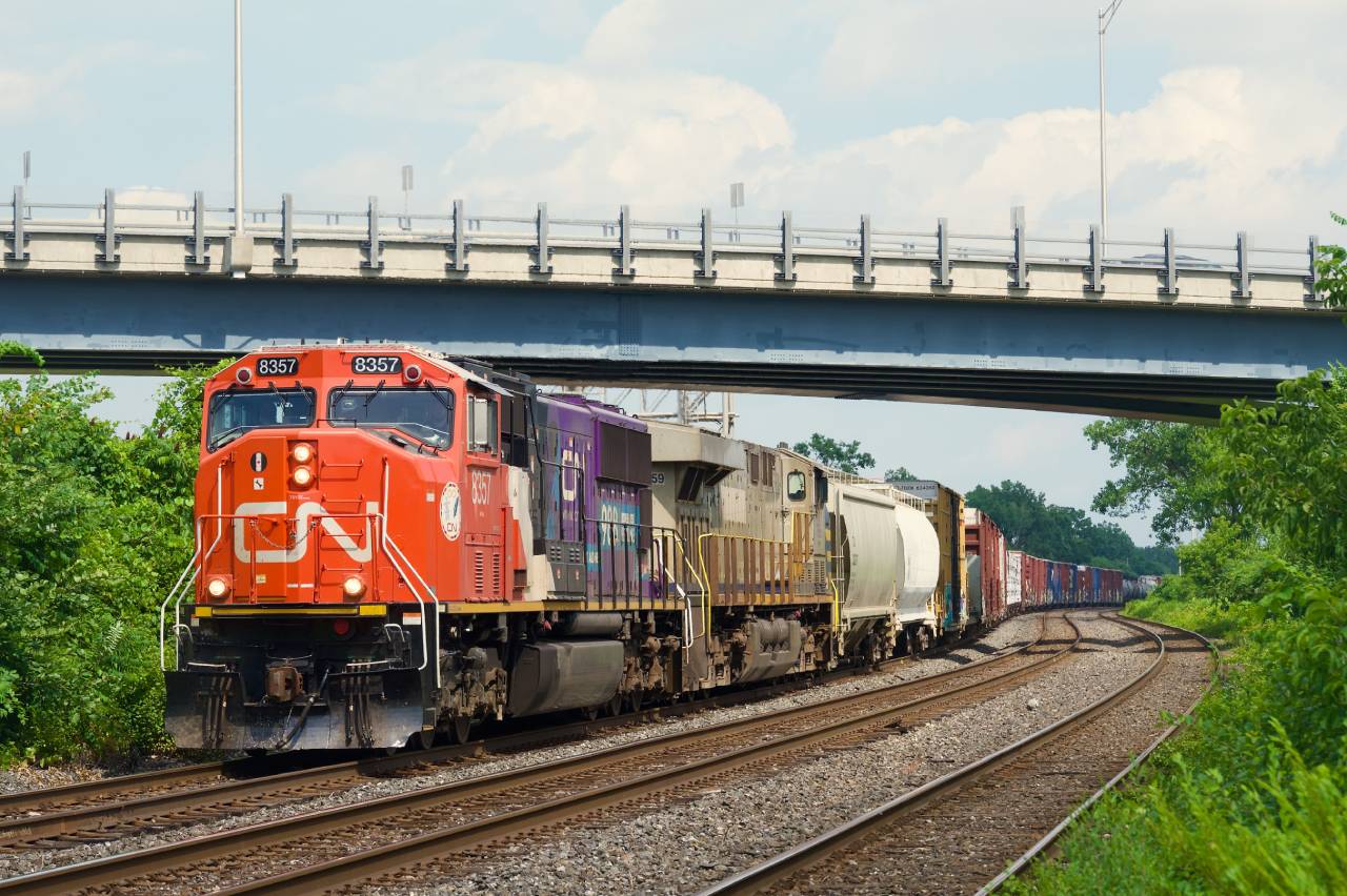 CN 8357 leads CN 369 through Dorval.