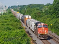 A very late CN 372 passes ties along the South Track of the Kingston Sub.