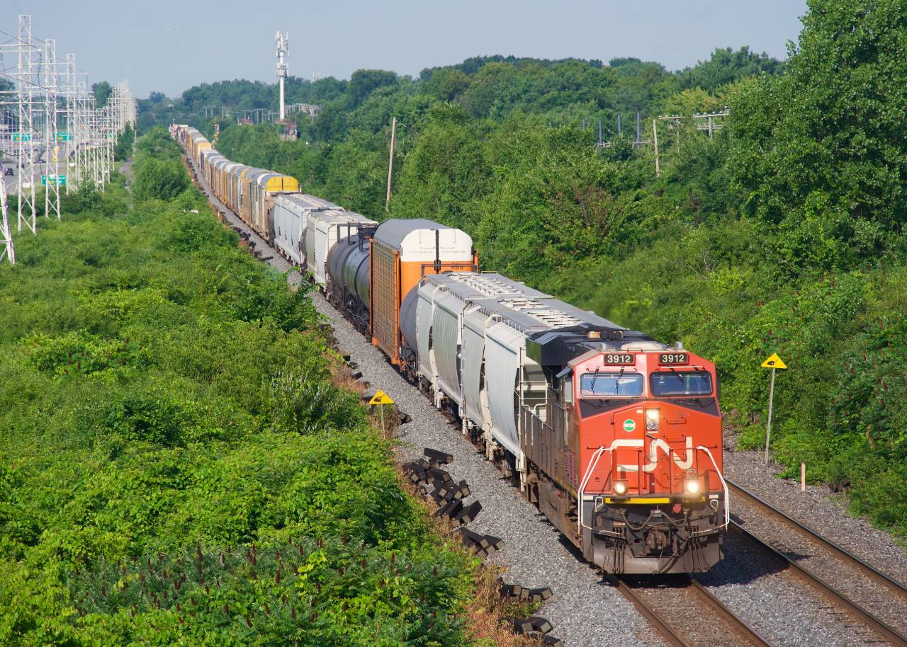A very late CN 372 passes ties along the South Track of the Kingston Sub.