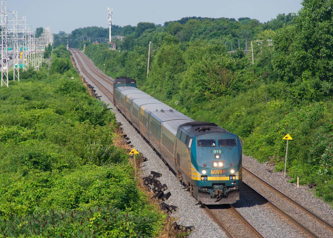 VIA 624 heads east through Beaconsfield with VIA 915 leading an LRC consist. VIA 624 on Saturdays only is the only eastbound train from Ottawa to not have a Siemens consist.