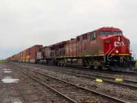 CP 9732 has a mixed up paint scheme as it leads CPKC 133,  with CP 9728 trailing.