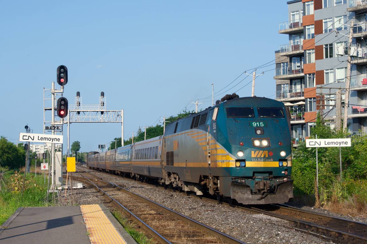Running an LRC consist for what might be his last time ever (and with rare non-wrapped P42DC leading), ICLE Julien Boily is in charge of VIA 39 as it approaches its next stop at St-Lambert Station. Julien is taking a break from his regular Northern Queb`ec runs to fill a vacancy in the Quebec City-Montreal corridor.