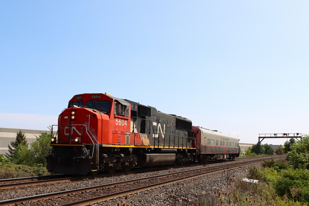 Eastbound TEST Train with Track Evaluation System CN 1057 only. Noticeably missing is the Deployable Gage Restraint Measurement System (DGRMS) boxcar. 48 mph over the detector, meeting M397 at Tansley.