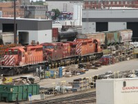 The Moose Jaw repair yard was a busy place on Tuesday August 11th. 5977 (EMD SD40-2), 8651 (GMP GP9) and 6077 (EMD SD40-2) are seen sitting in the yard waiting to be put back to work.