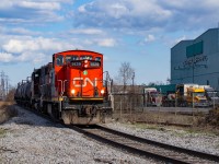 CN 1600 Yard Job comes around the wye on the New Gages Spur, pulling ahead to eventually clear the switch and shove back onto the Firestone for their night of work. <br><br>As far as I know this is the last shot of CN 1439 in service for CN. There was no else out this night, and the next morning the unit was off to Mac on 422 and out of active service.