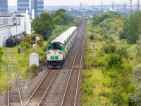 <h1><u><i>The Best Surprise</i></u></h1>

<p>After just missing a WB with a CREX leader by a minute I was quite frustrated. The train just meet an EB here, but it still had to wait for another EB train at Humber. 
<br>
Crossing over the busy Weston road waiting for a quick EB to shoot, I noticed something that definitely isn't a red locomotive in the distance!
<br>
Here an F59 takes the lead of an equipment move to Union, rerouting to the Bala sub to reverse to Mimico. 
<br>
This was probably one of the best examples of just waiting at a location for a train while not expecting anything good!
<br>
If anyone knows the last time this has happened, let me know in the comments!
</p>

