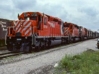 Crew change complete, the second section of a northbound time freight departs Mactier behind an SD40-2, SD40, and M636.

<br><br><i>Scan and editing by Jacob Patterson.</i>