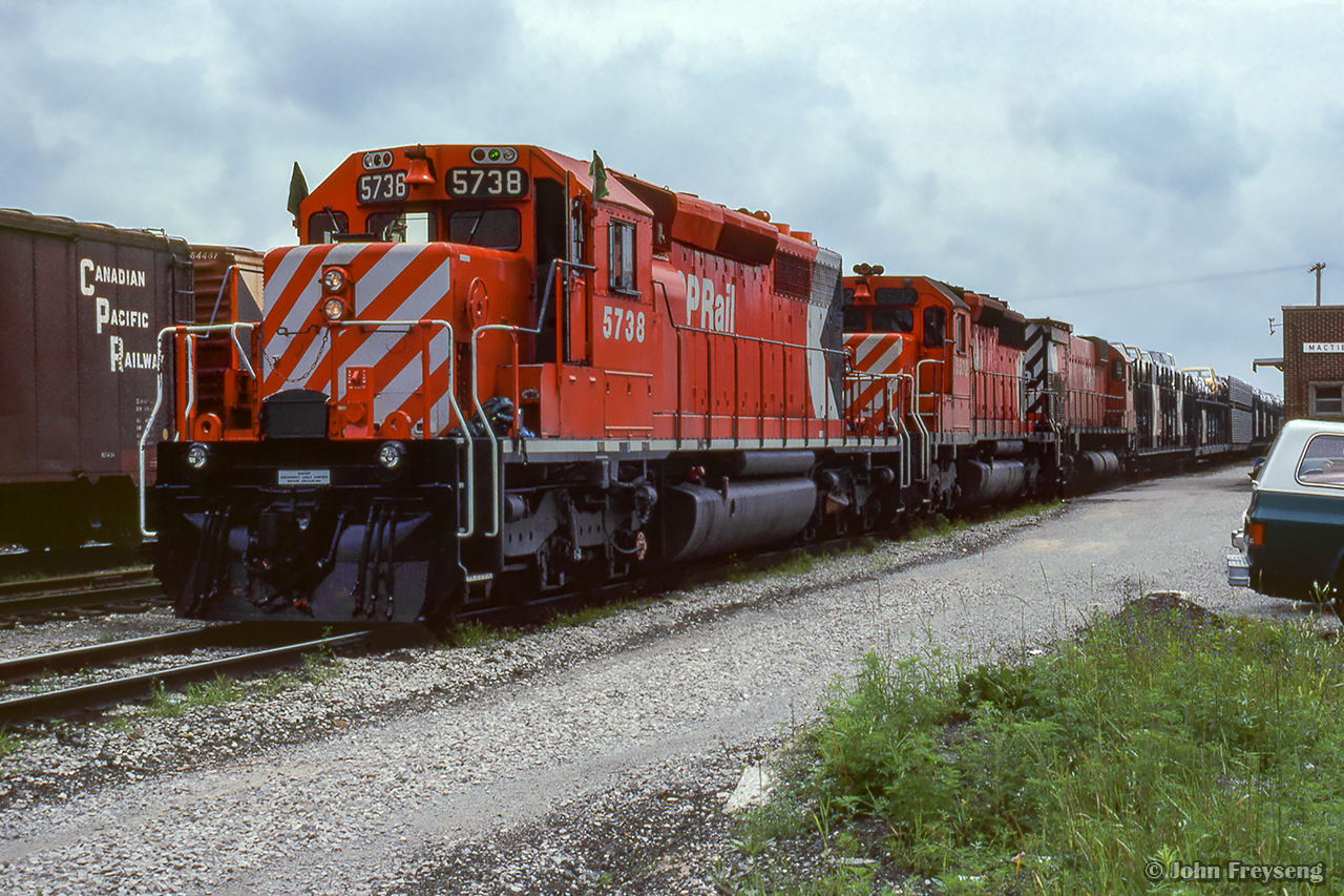 Crew change complete, the second section of a northbound time freight departs Mactier behind an SD40-2, SD40, and M636.

Scan and editing by Jacob Patterson.