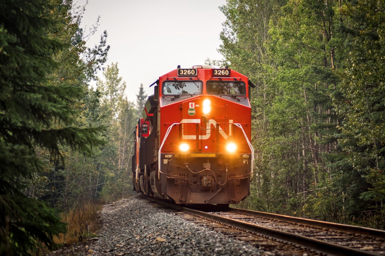 CN U75351 on the return trip from Prince Rupert. The train is passing Sandy Lake, a small lake mostly known by locals of the area.