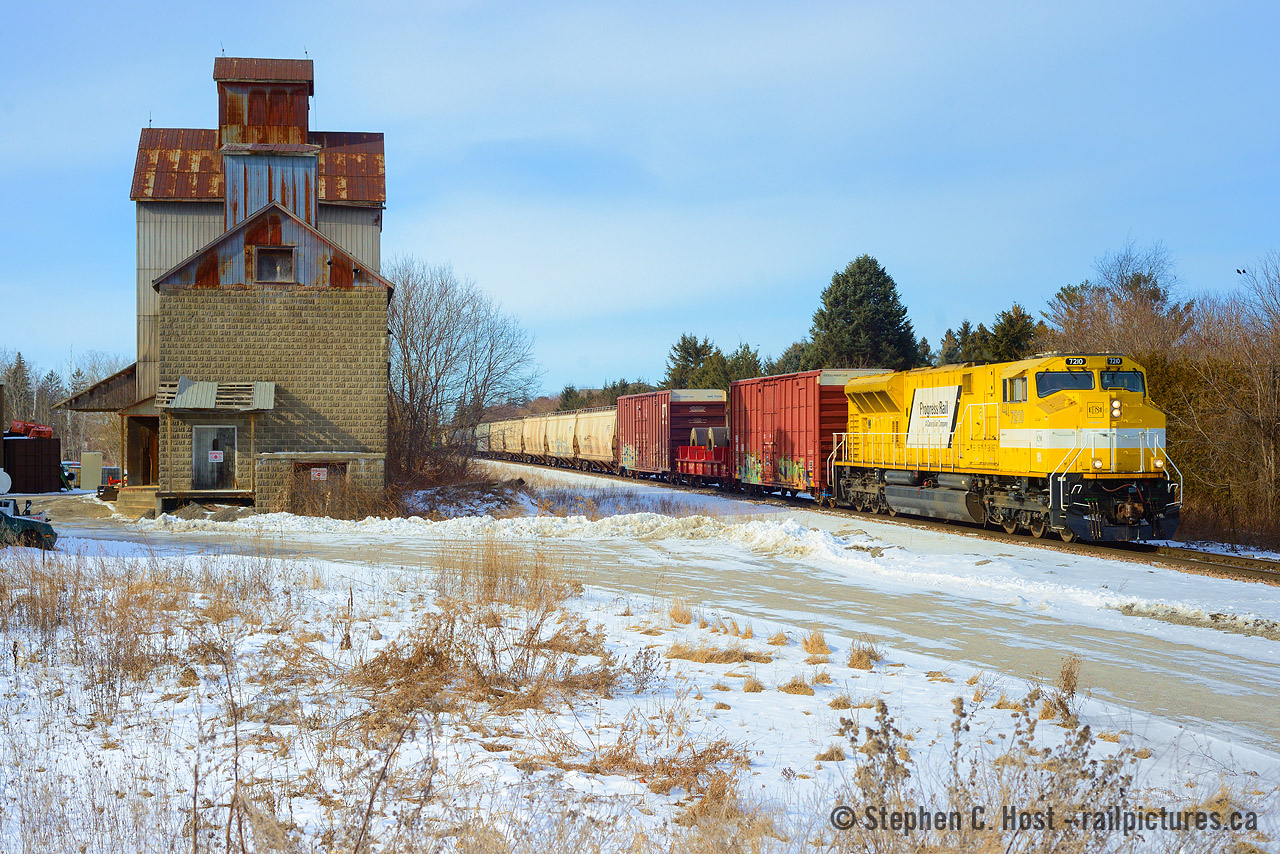 CP Train 420 passing the grain elevator at Kleinburg on the Mactier Subdicision on a cool winter's day in 2021.
Back in 2021 a couple of these yellow demonstrators led on the mainline on CP - and in 2019/2020 a different set were testing on CN. It looks like it's paid off, because CPKC has decided to order 65 similar units. These won't be the same as the demonstrators pictured here, they will have  modifications designed after feedback from demonstration runs including a new energy management system with a 5-7% fuel savings over prior Tier 4 units, and Talos Energy Management system amongst other improvements. In effect, I would say these would be a "dash two" of the SD70ACE-T4 series but Progress seems to have declined to call them anything but what they've always been referred to, which to me is strange. What do you think of the SD70ACE name for these Tier 4's? Comment below. As for the fate of these demonstrators, 7210 is now with Lake State Railway along with 7209, 7211 and 7212. A gaggle of earlier Tier 4 demonstrators from the 2019/2020/2021 era have also been recently scrapped after stints in mexico and elsewhere. Could a CN order be next? There's four demonstrators on CN right now.
