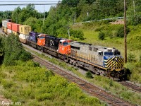 Z120 by me at 11:15 on August 13th at Springhill Jct NS, ex-CREX leader, CN 8357 "mental health awareness" facing forward and nice and clean. Elephant style head-end power Ex-CREX DPU facing west, lots of auto racks on the tail end. 420 axles, decent amount of containers and some tank cars in the middle.