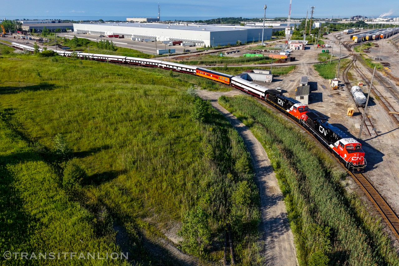 CN Office Car Special P00731 20 with CN 3309 and 3412 for power, deadheading to Oshawa yard this morning in preparation of the Niagara wine tasting excursion later. (2026/07/20)