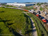 CN Office Car Special P00731 20 with CN 3309 and 3412 for power, deadheading to Oshawa yard this morning in preparation of the Niagara wine tasting excursion later. (2026/07/20)