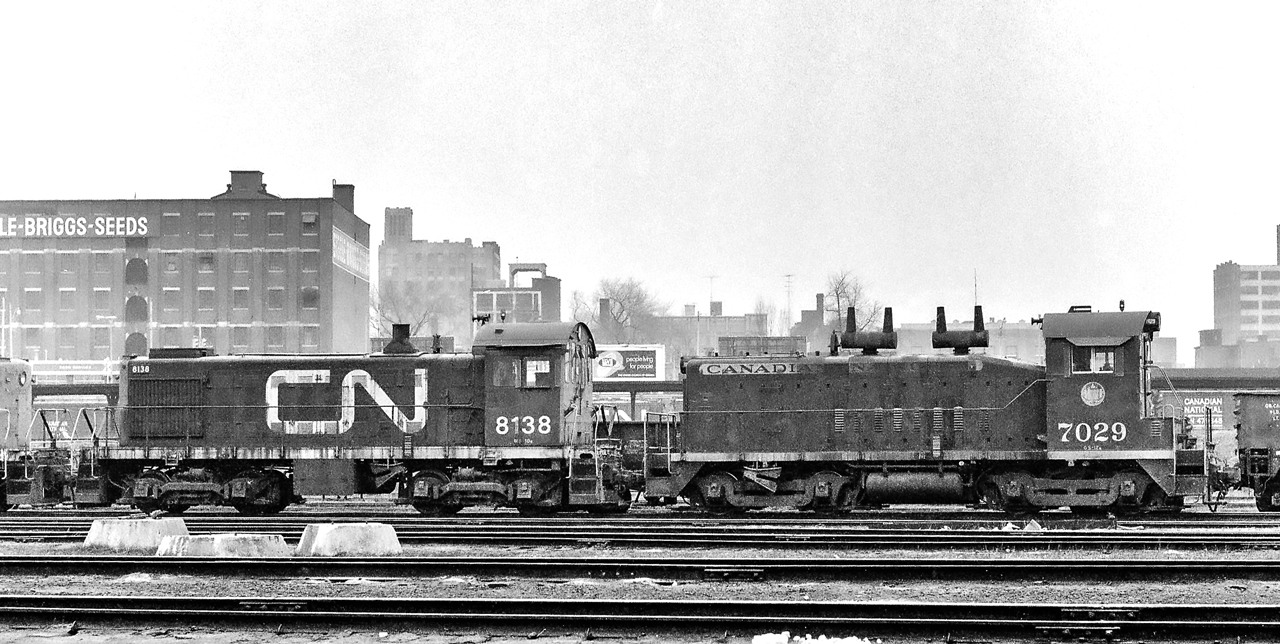 It is somewhen between 1969 and 1972 in Toronto where CN 7029 and CN 8138 are sitting in the CN Spadina yard.