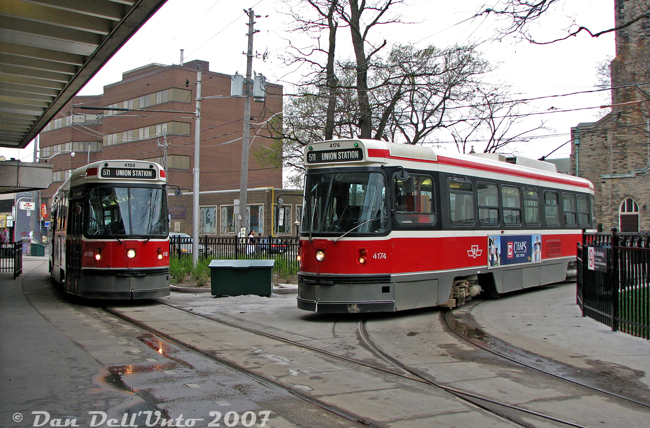 A normal everyday scene at Bathurst Subway Station for many years, but not to be repeated again with CLRV streetcars today: TTC 4188 on a northbound 511 Bathurst run arrives into the station's streetcar loop, meeting sister car 4174 laying over between runs on the station's pocket track. Both cars were retired in 2017 after 36 years in service.