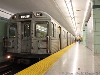 An H4 in the wild, in its natural habitat on the Bloor-Danforth subway line. Minutes before a <a href=http://www.railpictures.ca/?attachment_id=328><b>brand new Toronto Rocket (TR) set</b></a> in testing service rolled into the station upstairs, the oldest relics of the subway line were still hauling passengers below. TTC H4 5602 leads a 6-pack of the <a href=https://www.railpictures.ca/?attachment_id=60010><b>1970's Hawker Siddeley cars</b></a> westbound, pausing at St. George Subway Station just before 10pm on the way west to Kipling Station.<br><br>The <a href=http://www.railpictures.ca/?attachment_id=10476><b>new TR cars</b></a> spelled the end of the entire H4 fleet by January 2012, pushed out by Yonge-University-Spadina line <a href=http://www.railpictures.ca/?attachment_id=5620><b>T1's</b></a> transferred to the B-D line. The <a href=http://www.railpictures.ca/?attachment_id=52947>H5</b></a> and <a href=http://www.railpictures.ca/?attachment_id=12172><b>H6</b></a> fleets were also retired as deliveries continued.