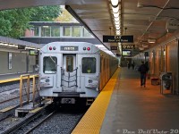 A bit of a rainy day outside along the open-cut section of the Yonge subway line finds TTC 5772 trailing a set of Hawker Siddeley H5's southbound, departing Rosedale Subway Station. Ridership is a bit sparse during afternoons at Rosedale, as evident here. The old "Next Train" destination boxes were relics that once showed if the next train was short turning at a particular station, or heading all the way to the end of the line. The platform displays playing City Pulse (or City Panic, to some) 24 show showers, showers and more showers for the day, and they weren't wrong.