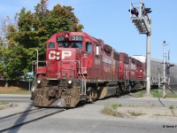 CP 3011 and 3099 work the Toyota plant in Cambridge with a pair of venerable GP38-2s in original CP paint. Now that several of CP's fleet of geeps are getting repainted into the corporate CPKC scheme, it is always refreshing to catch one in the original CP beaver scheme. They are pictured crossing Fountain St. in an area known as Hagey. 