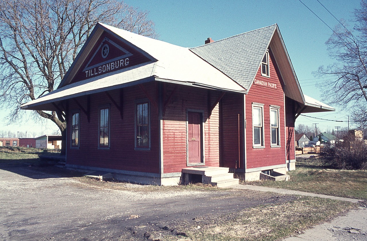 Here's a "sunny side" view of the old Tillsonburg (my back still aches when I hear that word) CPR station. By the early 1980s the railroad no longer had any use for the building, and it sat empty, and very fortunately not vandalized to any degree.  In 1992 it was relocated over to Bridge St next to the CN Tillsonburg North station and the two old stations combined to become the Tillsonburg Station Arts Complex.
In this image, the building was on the east side of King St just south of Concession St. West.
Tillsonburg was a great place for tracks and stations back then.