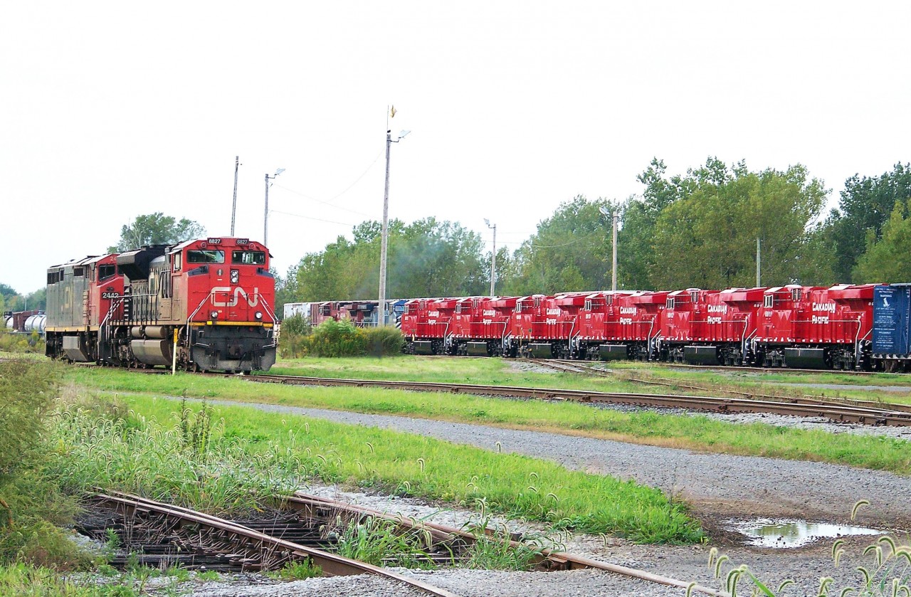 Can it really be 15 years already as I post this? But it has. In 2011, CP was taking delivery of their newest batch of locomotives, the seemingly endless series of ES44AC behemoths and this group behind CP 9768, CEFX 1031 number 8913, 8914, 8910, 8915, 8912 and 8914. CN 8827 and 2442 witness the move. Train is CP #255.
