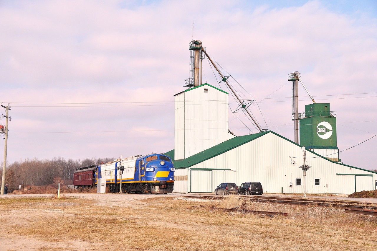 OSR ran a Christmas Special outing for the family on the 21st on Dec, 2014. Seen here crossing Mount Elgin Rd in the town of that same name are OSR 1401, 1400 & their heavyweight, x-CP #24. Route was Salford  to Tillsonburg and return.