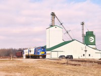 OSR ran a Christmas Special outing for the family on the 21st on Dec, 2014. Seen here crossing Mount Elgin Rd in the town of that same name are OSR 1401, 1400 & their heavyweight, x-CP #24. Route was Salford  to Tillsonburg and return.