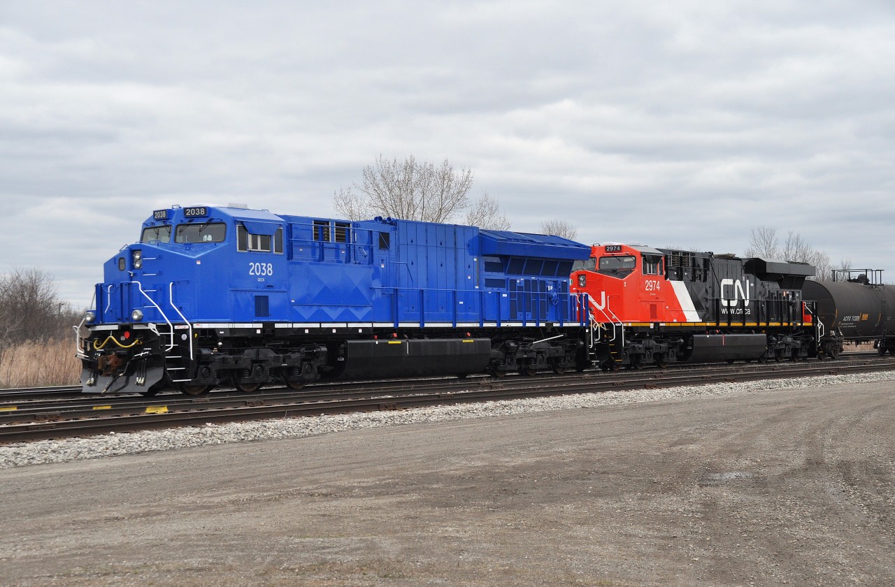 GECX 2038 and CN 2574 looking rather spiffy, having newly arrived in Canada via the Fort Erie International Bridge.  The GECX, as far as I know, is still making the rounds on CN as a leased ET44AC demonstrator.