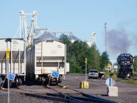 A pair of Sartigan Railway RS-18's are being started up at the start of their shift at Saint-Lambert-de-Lauzon, where the Sartigan has a number of clients.