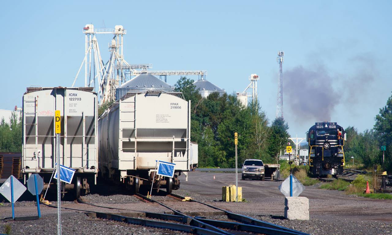 A pair of Sartigan Railway RS-18's are being started up at the start of their shift at Saint-Lambert-de-Lauzon, where the Sartigan has a number of clients.