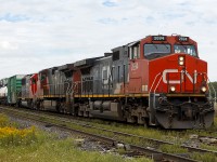 Having visited <a href="http://www.railpictures.ca/?attachment_id=59948"> the Glenfraser on VIA's 40th Anniversary train </a> just a couple of weeks prior, I was back in the area again for another event. After lunch, I headed out to see what might be out there. Along came this train, and sometimes I wish they CN would switch things up like CP did with <a href="http://www.railpictures.ca/?attachment_id=30101"> 5039 leading two KCS 'Southern Belles' leading 650 from July 2017. </a> However, CN 5487 is third in charge as it passes by eastbound just outside of Sarnia.