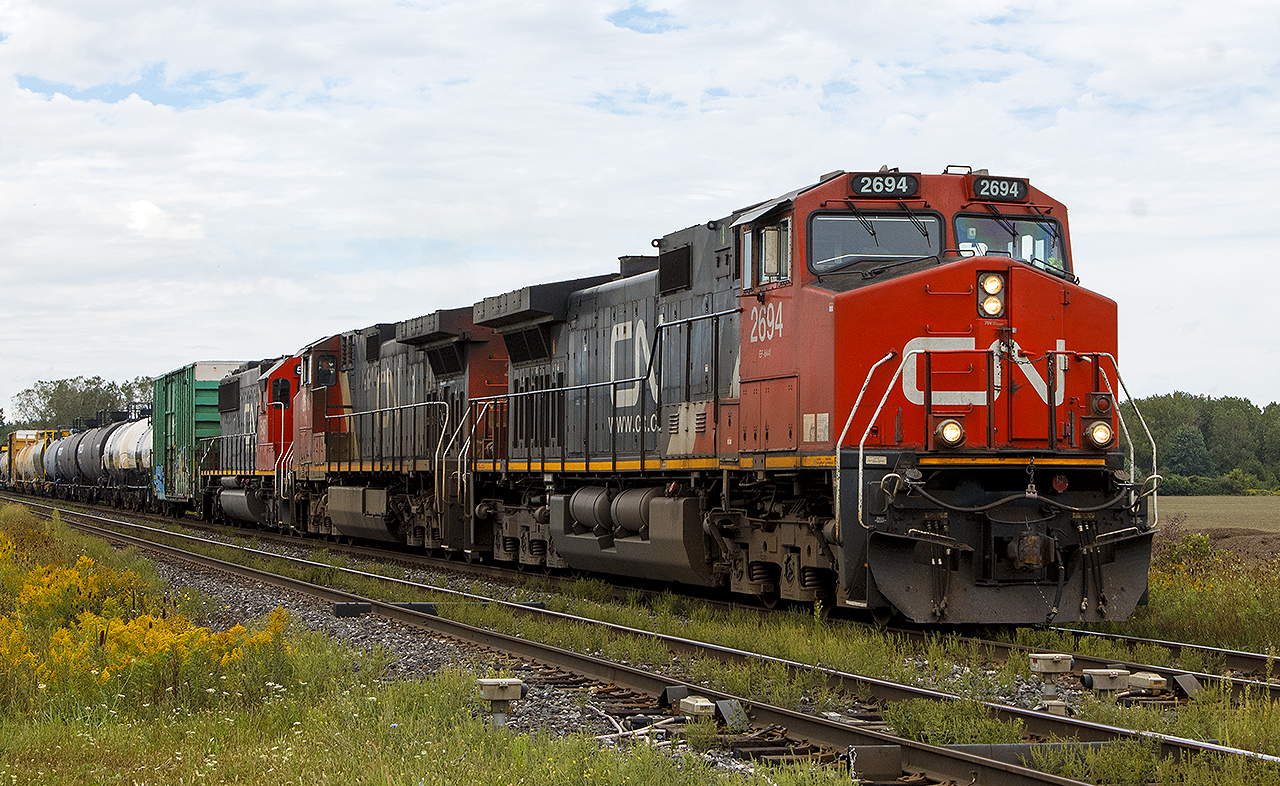 Having visited  the Glenfraser on VIA's 40th Anniversary train  just a couple of weeks prior, I was back in the area again for another event. After lunch, I headed out to see what might be out there. Along came this train, and sometimes I wish they CN would switch things up like CP did with  5039 leading two KCS 'Southern Belles' leading 650 from July 2017.  However, CN 5487 is third in charge as it passes by eastbound just outside of Sarnia.