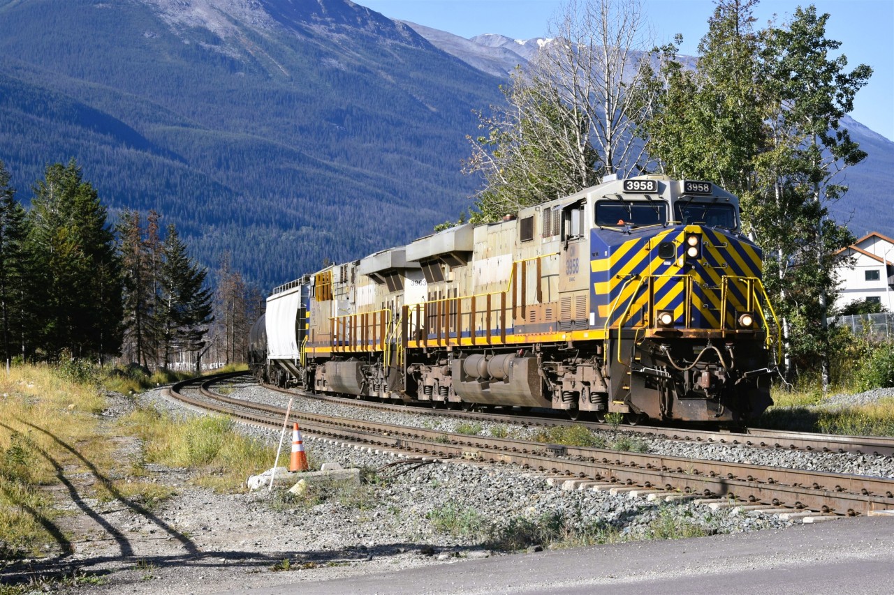 Re-crewed and on the move >/b> 
With a fresh crew on board CN 3958 with CN 3963 in tow moves eastward at Mile 0.29 Albreda Sub. just prior to occupying the Hazel Avenue crossing at the entrance to CN's yard in Jasper, AB. 
A beautiful day in Jasper on my birthday! :-)