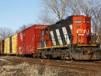 Having led 514 earlier in the day, zebra striped 4125 sits in the siding at Keil Drive. This old veteran will later be picked up by train 438, along with the 5 cars behind the unit.